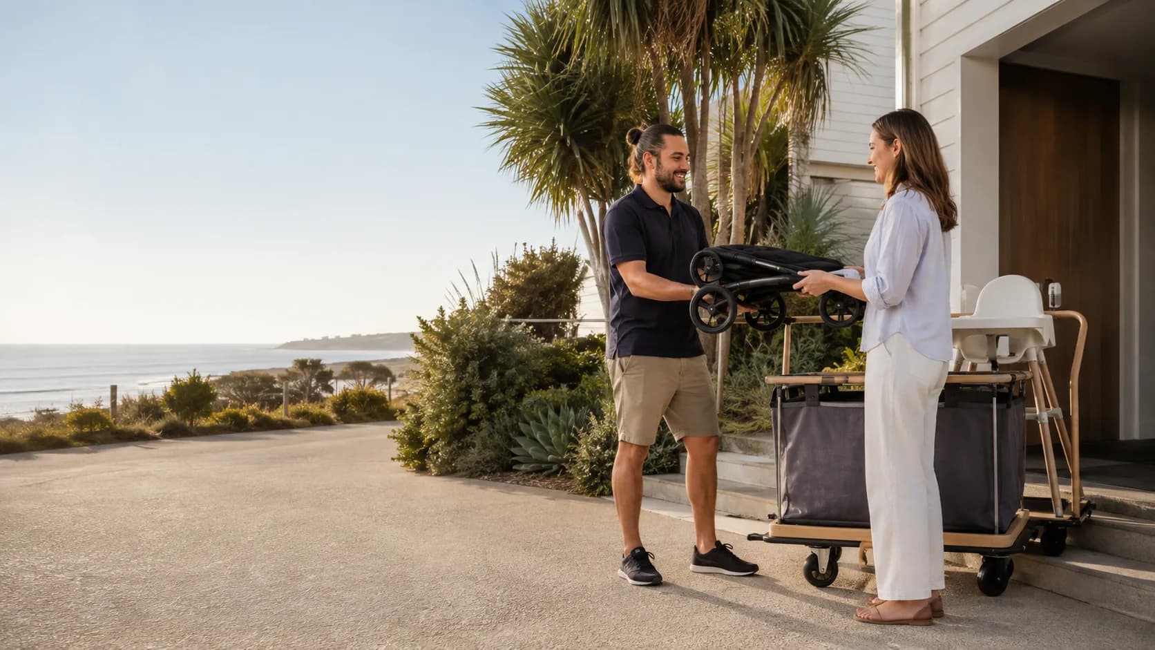 Operator delivering a pram and high chair at an holiday home in Australia