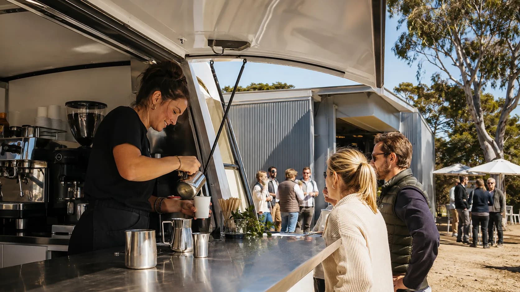 coffee van serving a bright outdoor morning event in Australia