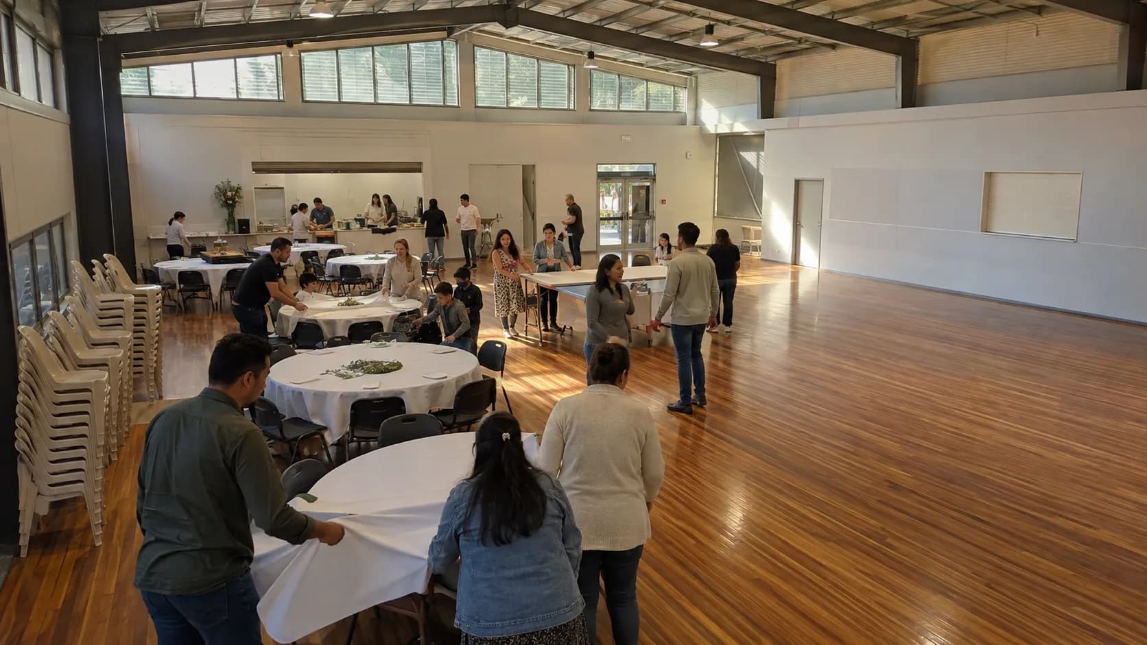 Families prepare a bright community hall for a weekend celebration