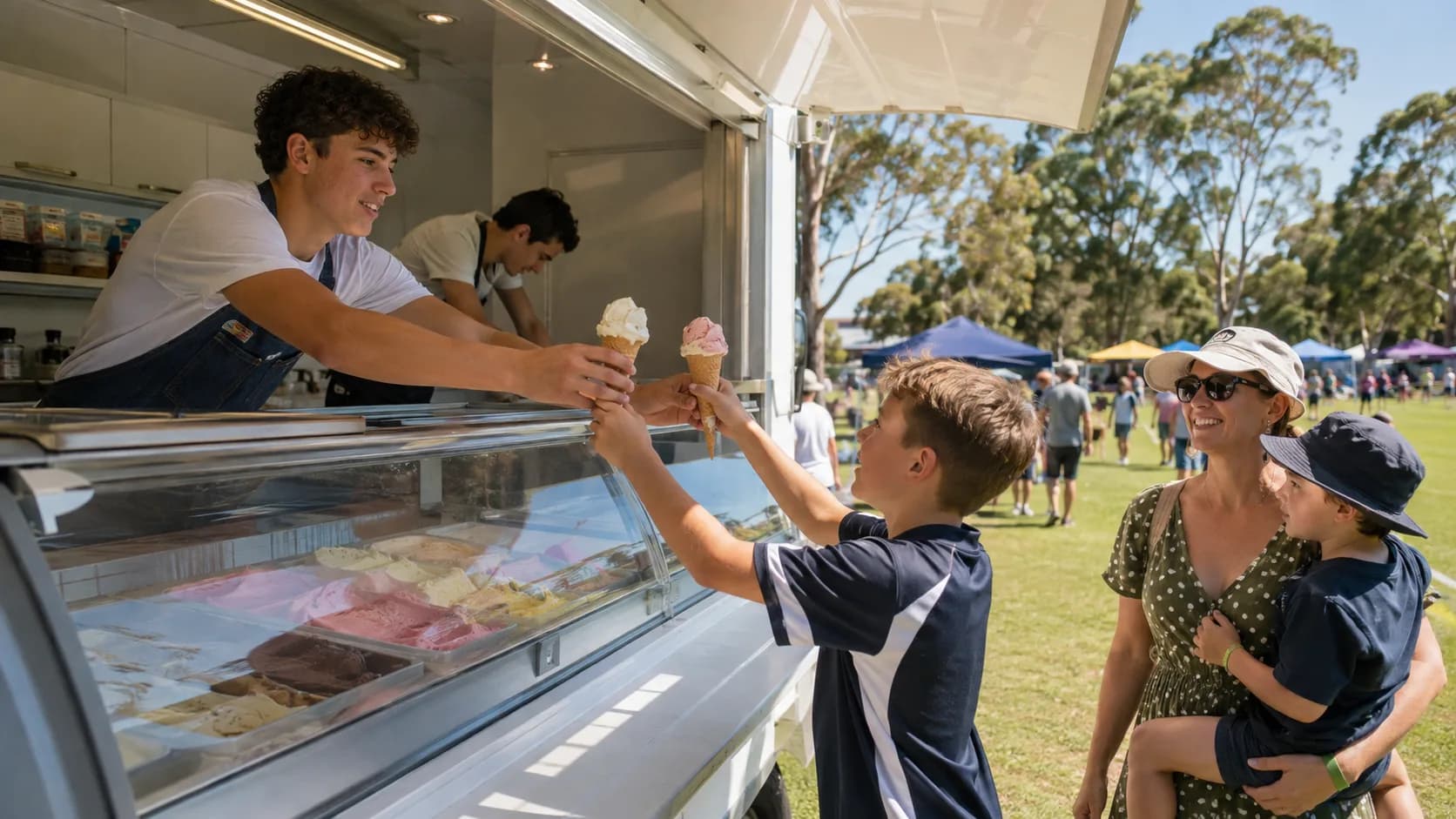 ice-cream van serving families at a sunny school fair in Australia