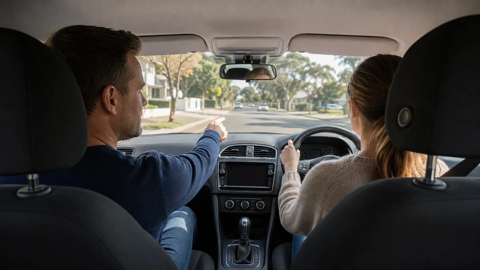A driving instructor and learner on a lesson in Australia