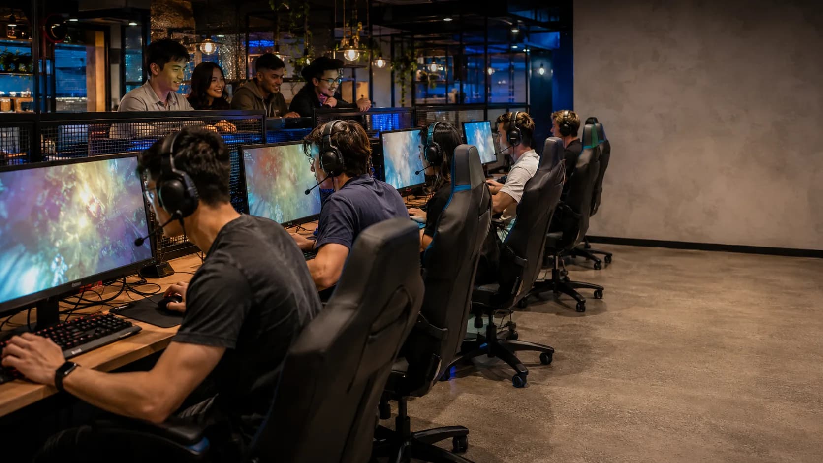 Players compete across occupied gaming stations in a bright esports venue