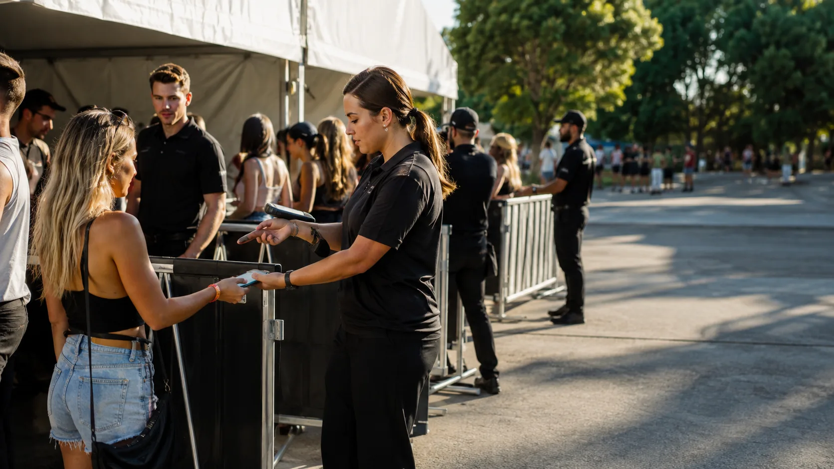 Event security staff calmly managing guest entry at a booked event in Australia