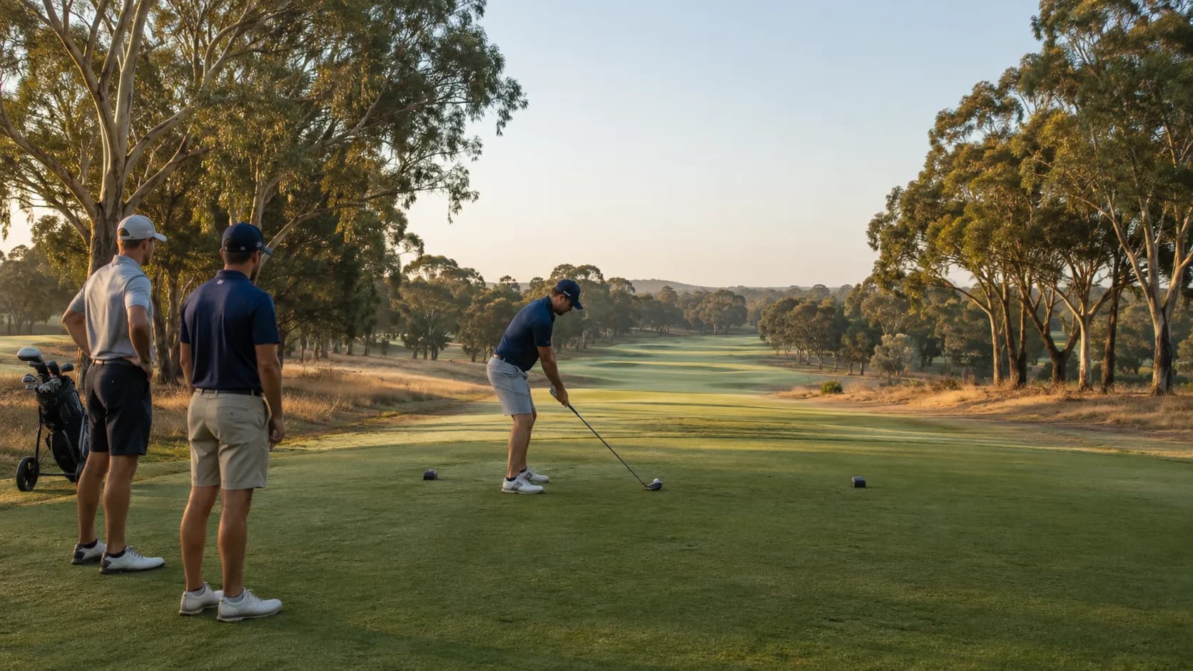 An Australian golf course at first light, the fairway open ahead of the morning tee times