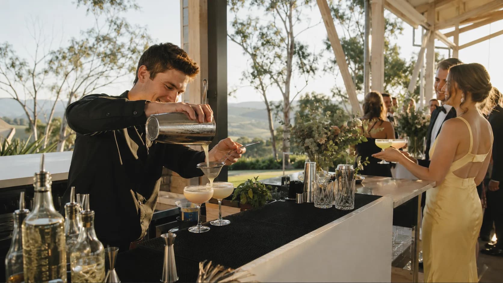 mobile bartender mixing cocktails at an outdoor wedding in Australia
