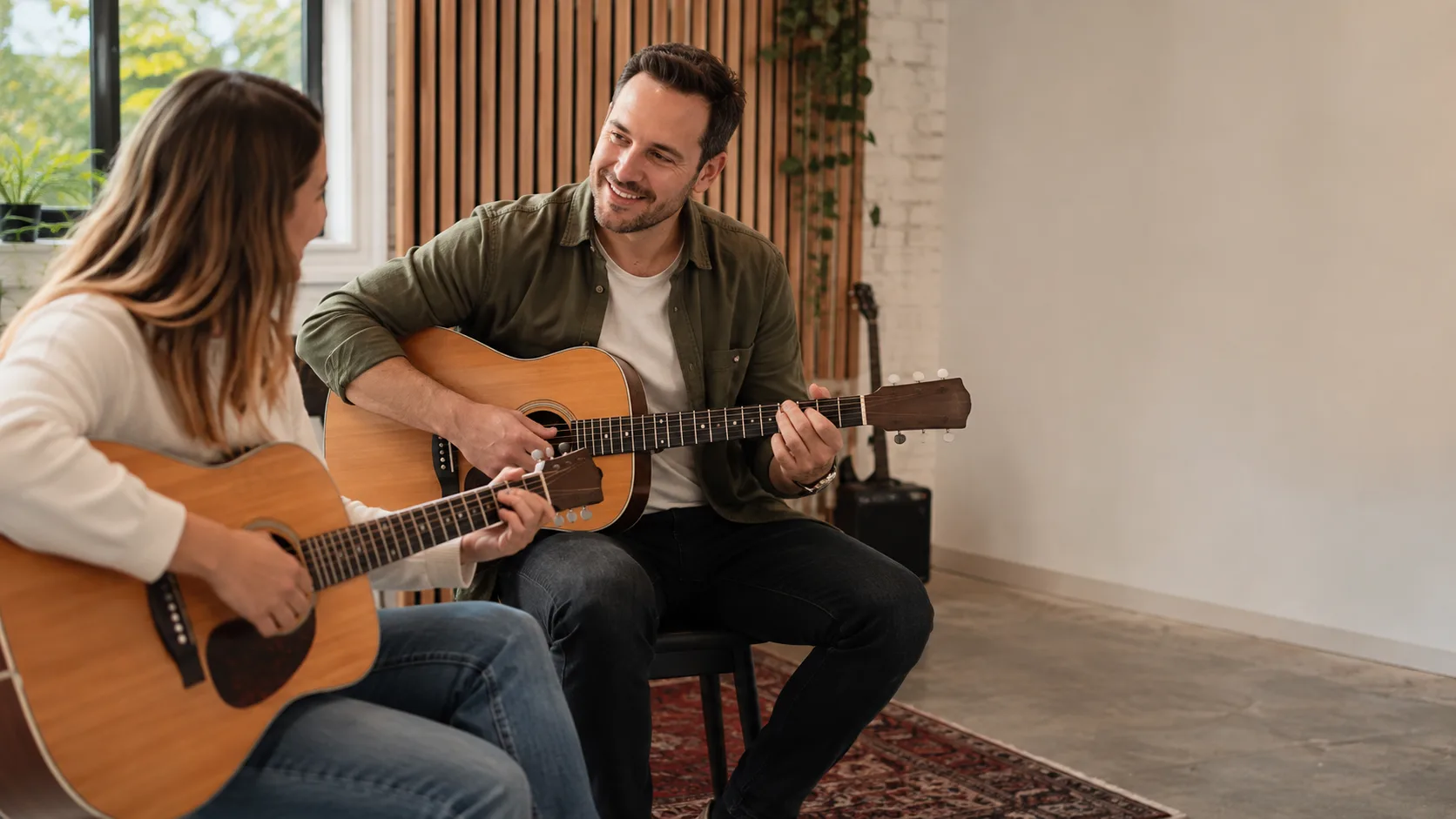 Guitar teacher guiding a student in a bright Australian music studio