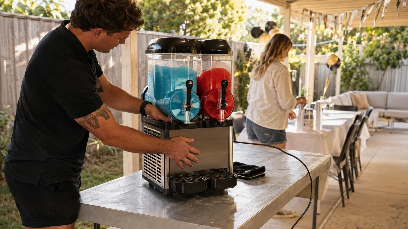 A fairy floss machine and a slushie machine loaded in a van at an Australian park