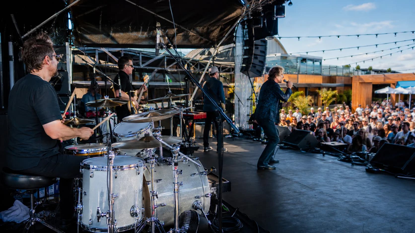 Cover band performing a lively live set for event guests in Australia
