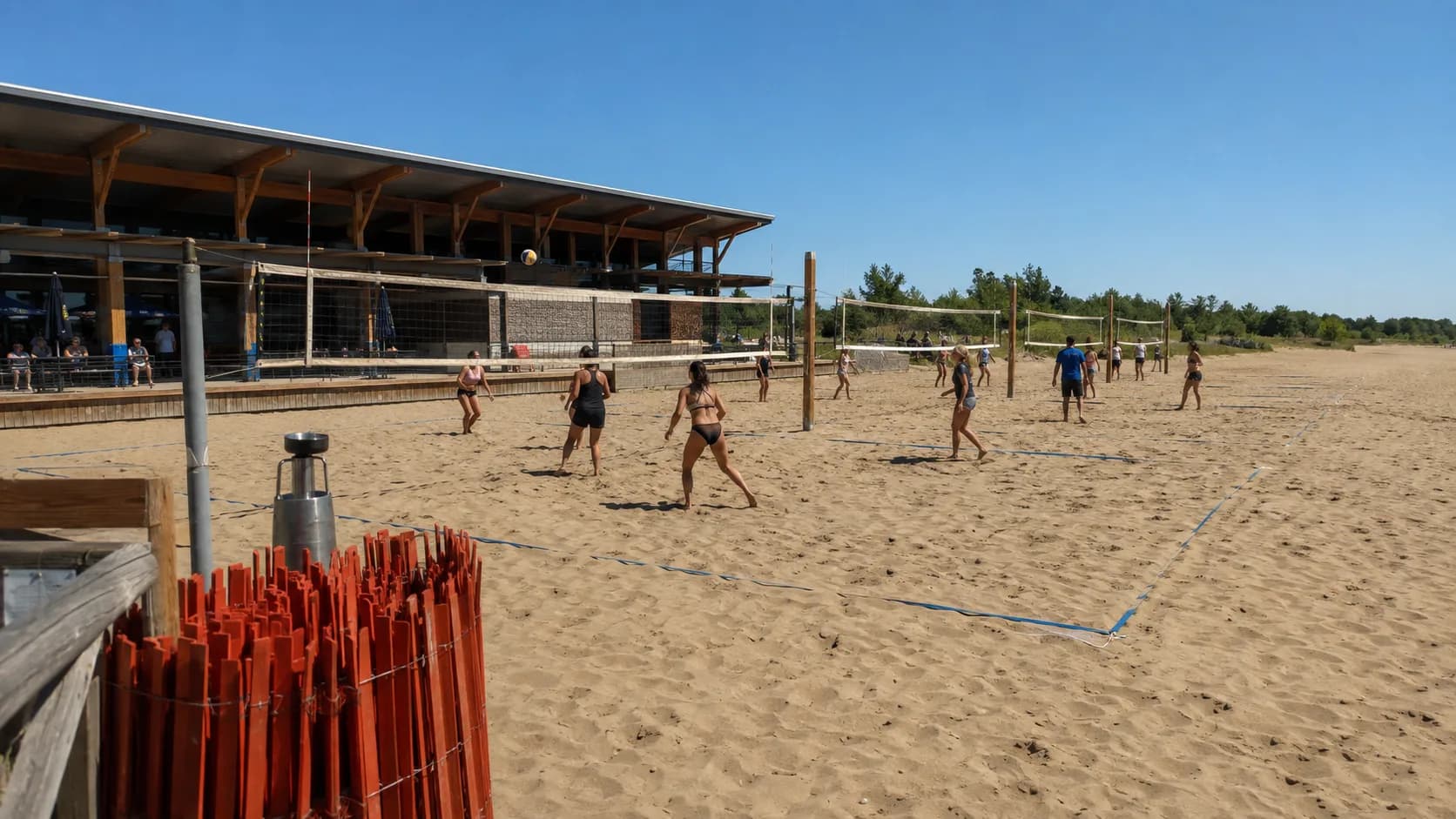 Players use lively summer beach volleyball courts at a Canadian venue