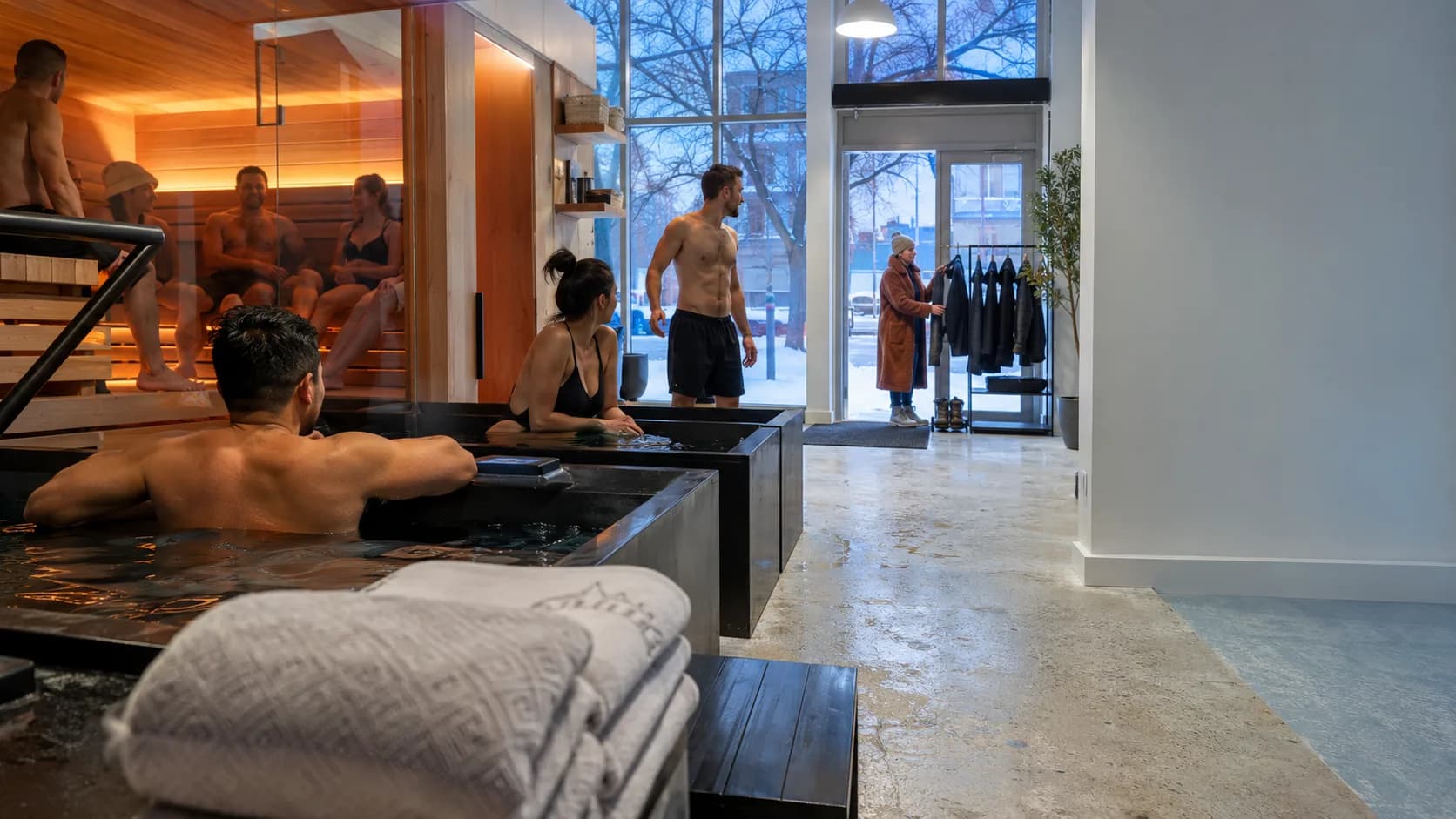 Customers arrive at a bright Canadian contrast suite for their booking