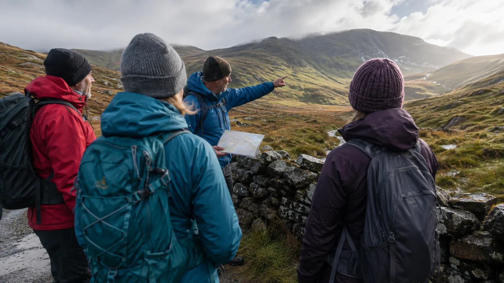 A navigation outdoor instructor briefs walkers in the hills of Ireland
