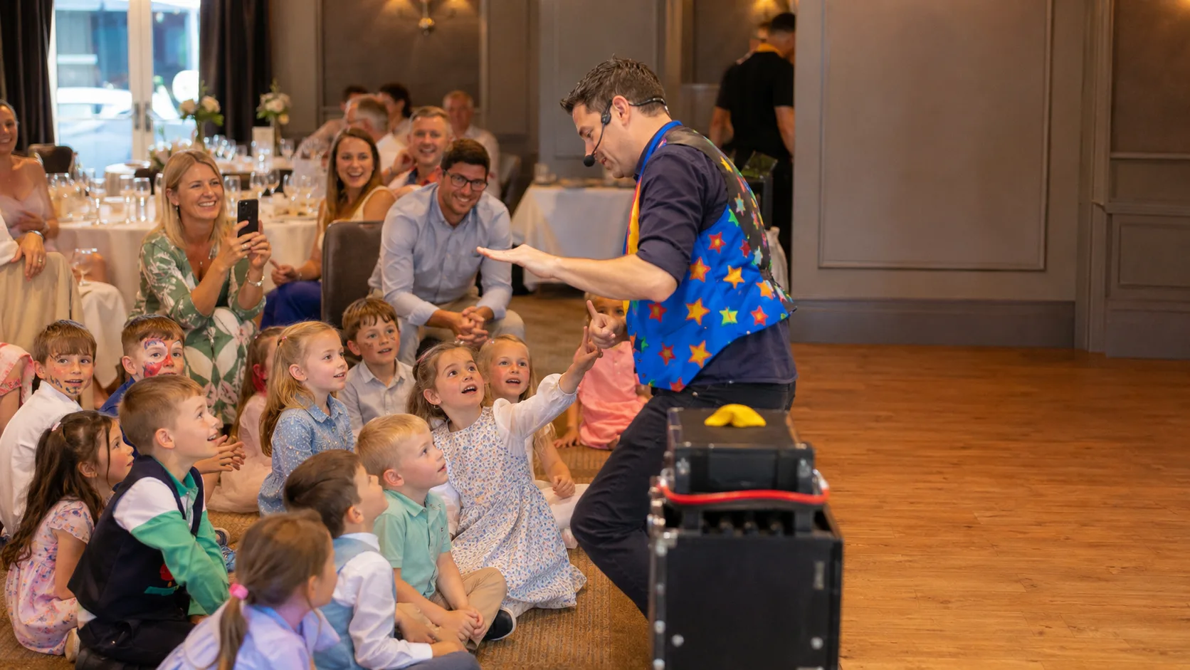 Children’s entertainer leading a cheerful party activity for families in Ireland
