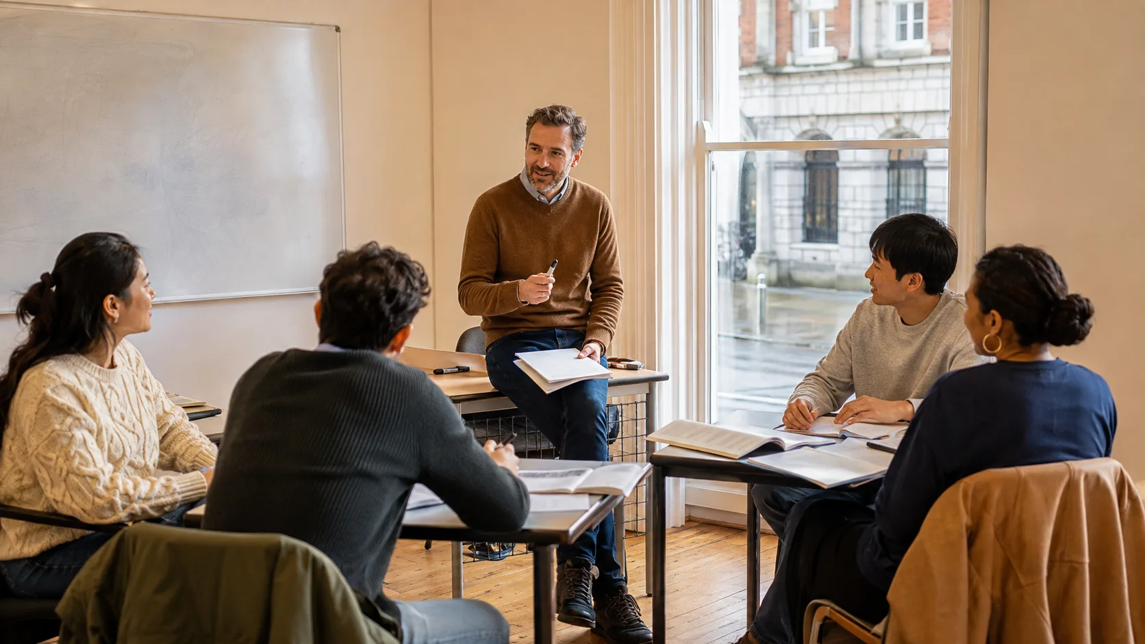 Adult English class working together in a classroom in Ireland