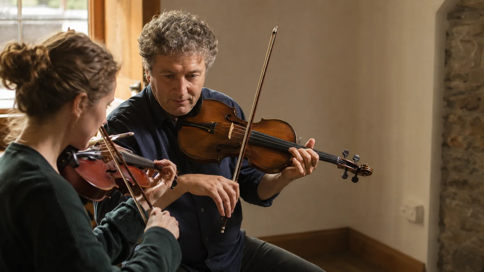 Traditional fiddle lesson inside a warm music academy in Ireland