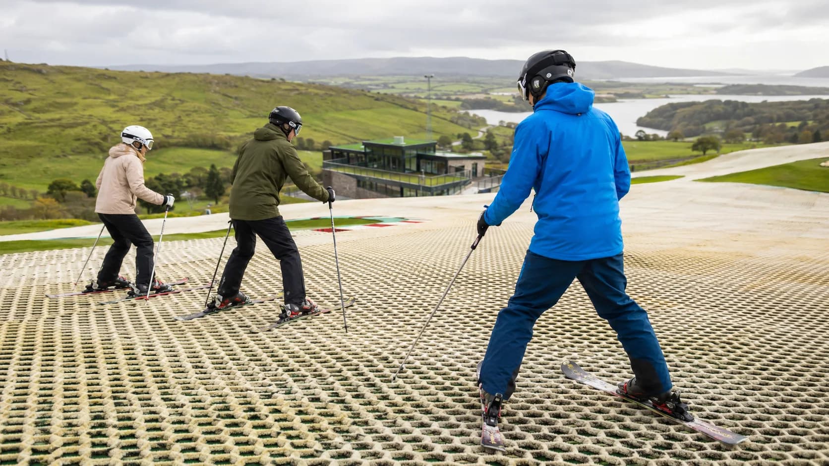Ski instructor teaching beginners on a dry slope in Ireland