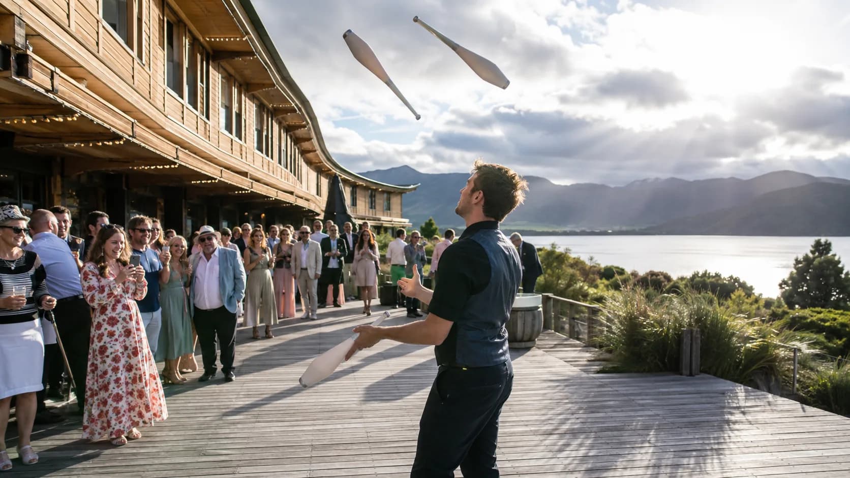 Roving circus performers entertaining a busy event crowd in New Zealand
