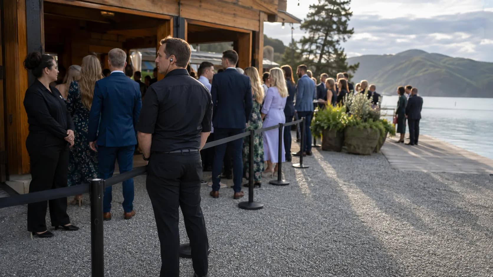 Event security staff calmly managing guest entry at a booked event in New Zealand