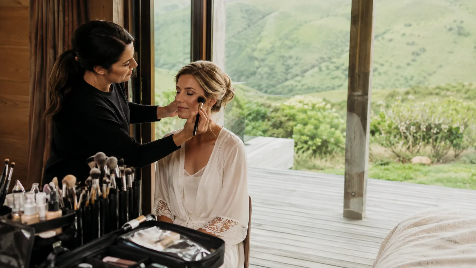 Makeup Artist delivering a booked mobile service for a customer.