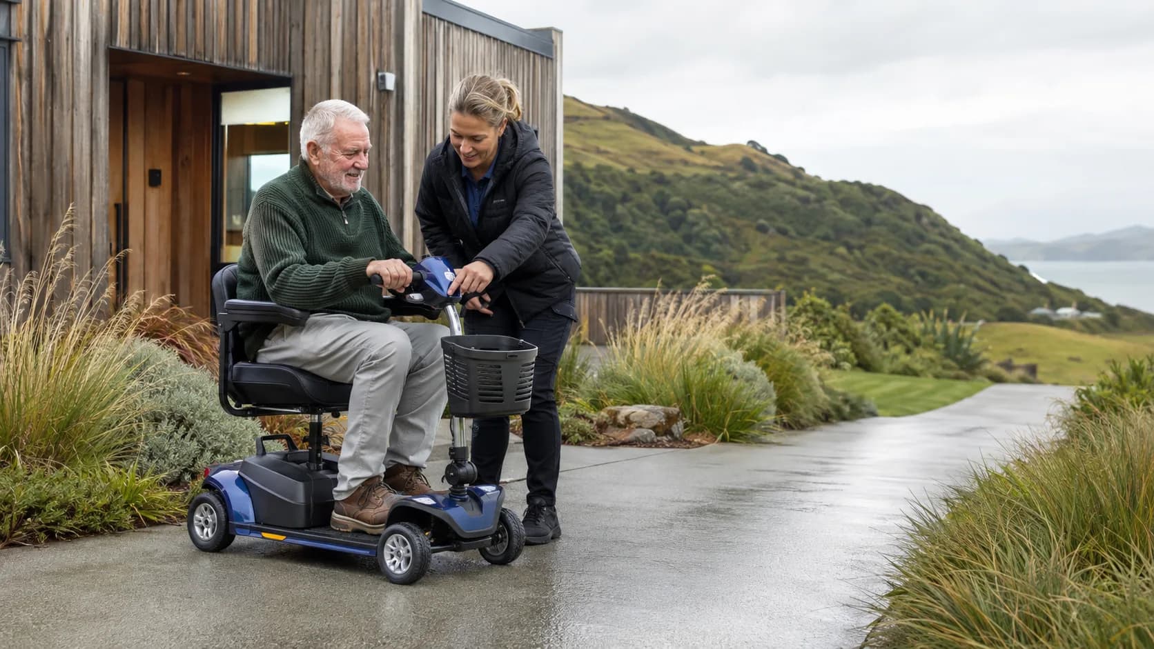 Guest receiving a mobility scooter at a New Zealand holiday home