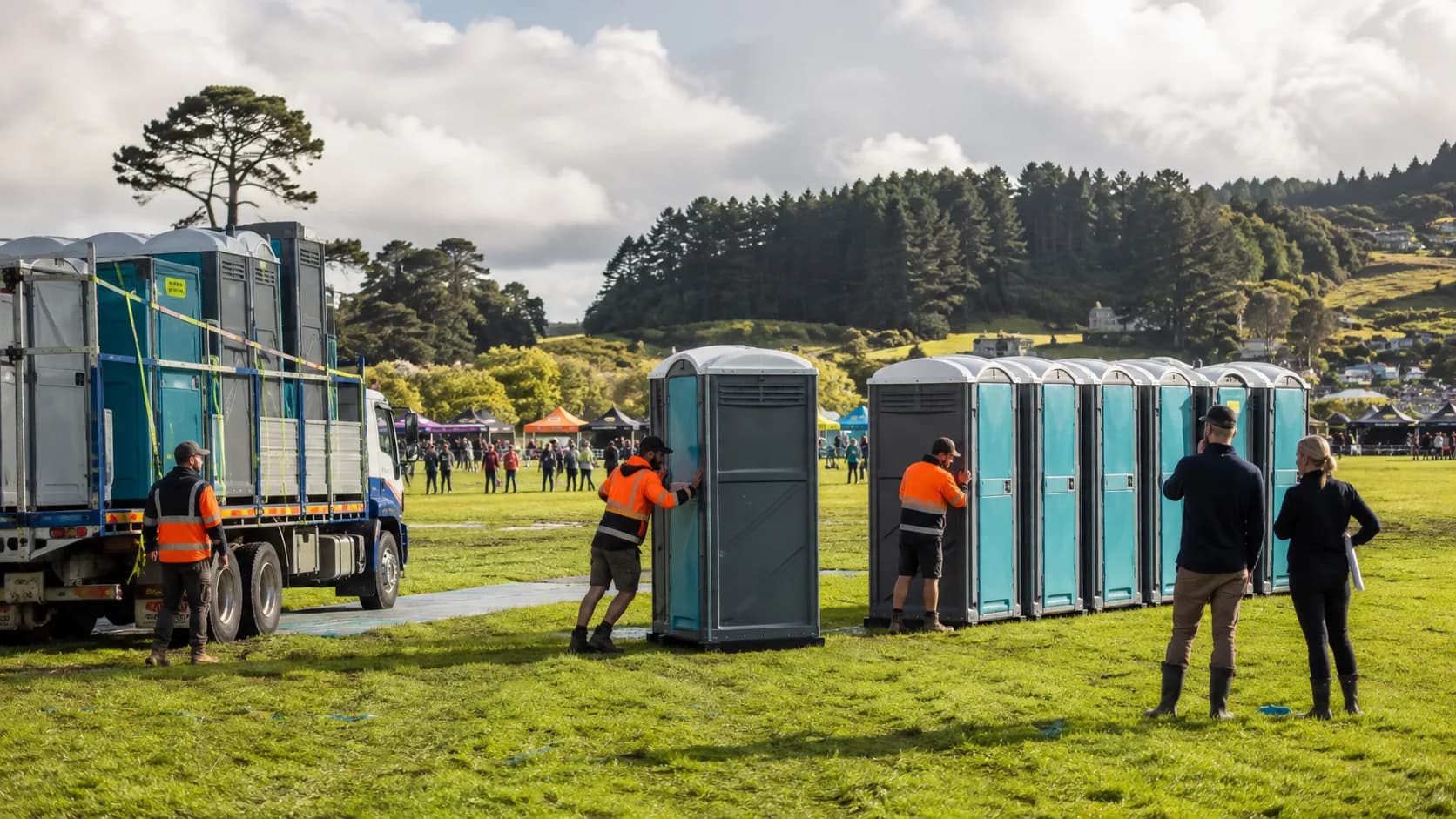 Customers collect booked portable toilet unit model from an active New Zealand business