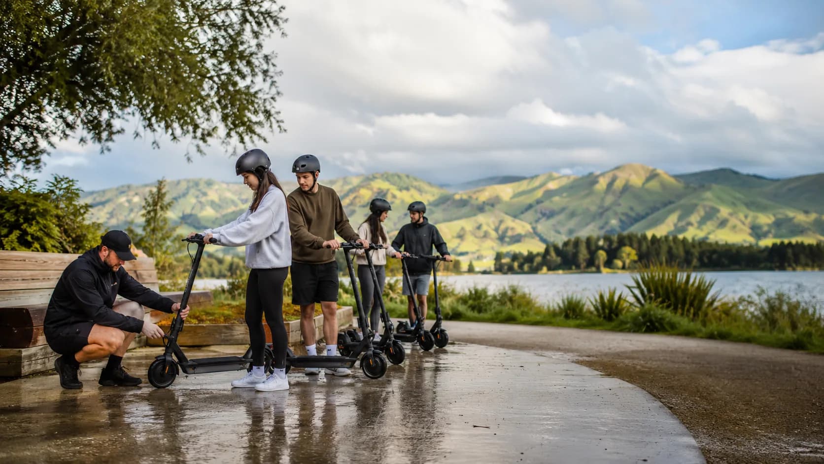 Customers collect booked scooter model from an active New Zealand business