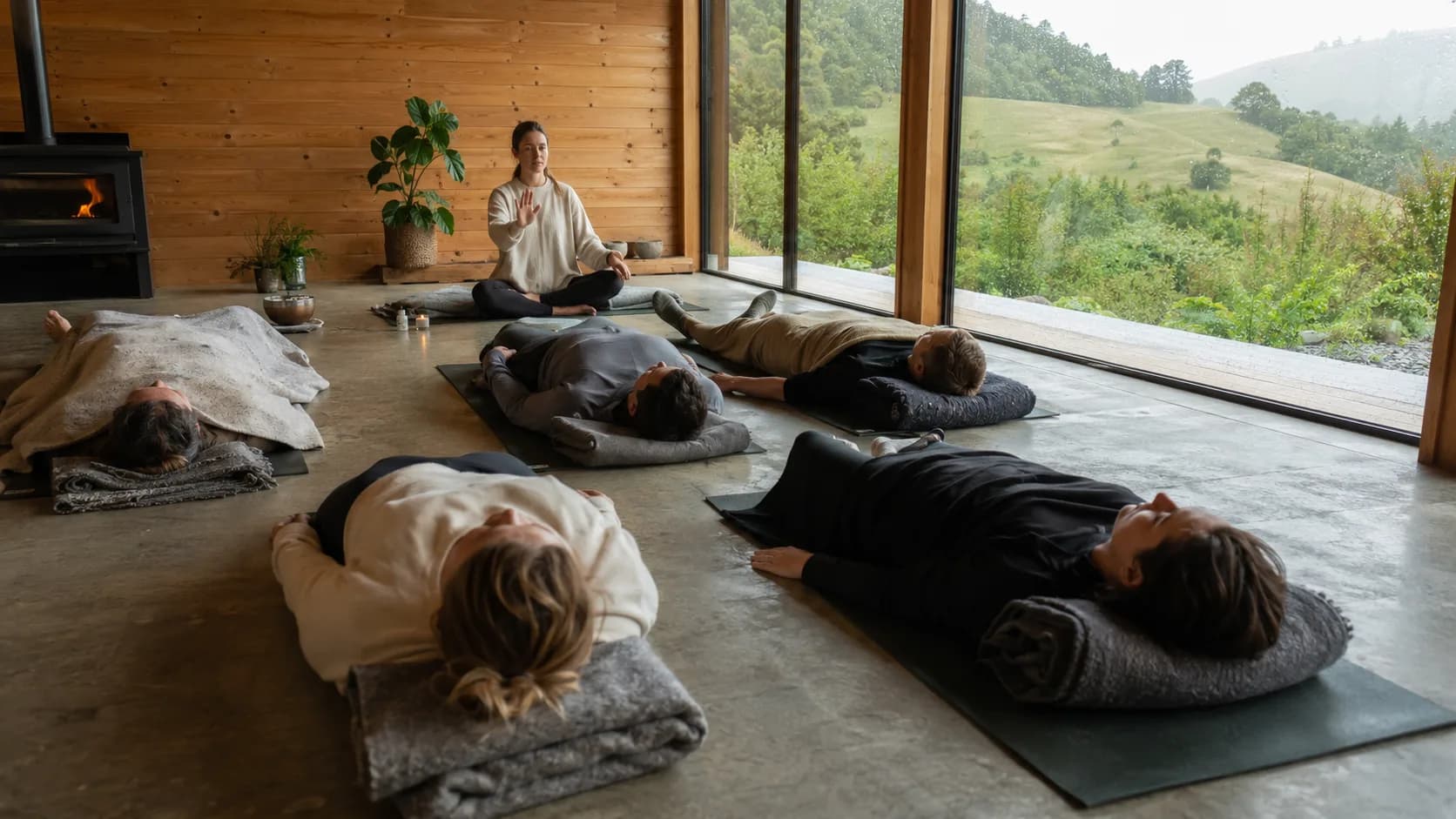 For sound and breathwork, participants settle onto mats for breathwork in a New Zealand studio