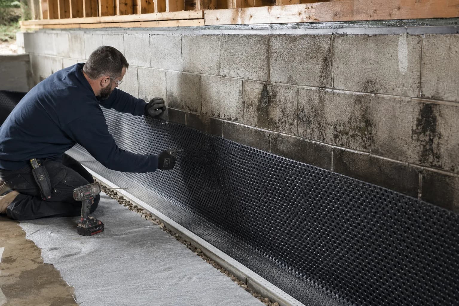 A damp specialist taking moisture readings in a house in the US