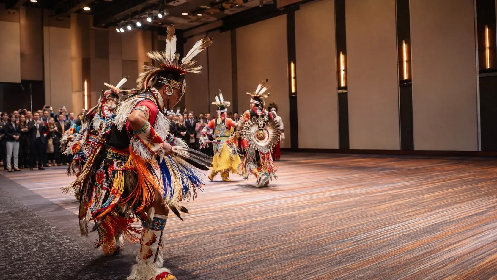 Dance troupe performing for a gathered event audience in the US