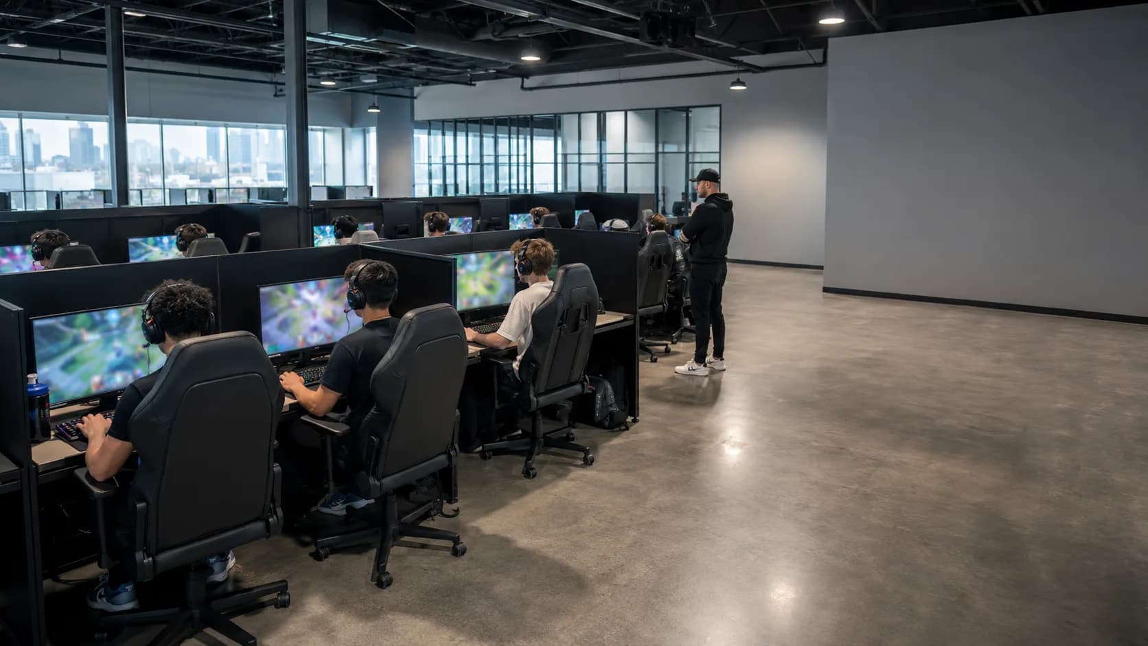 Teams compete across a polished US esports floor during a tournament