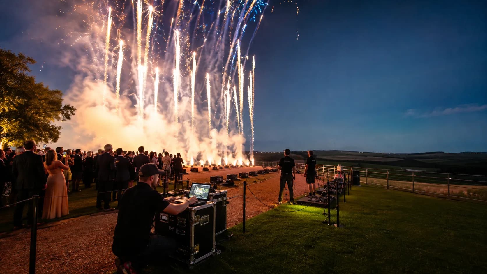 Controlled cold spark or fireworks display illuminating a booked event in the US
