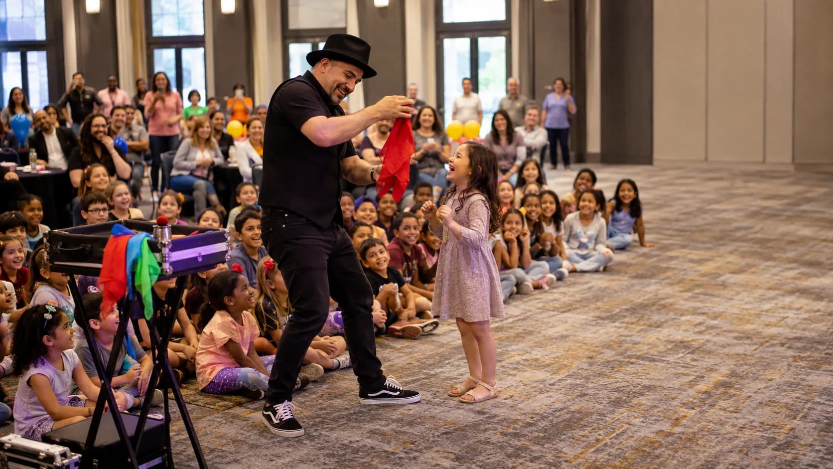 Children’s entertainer leading a cheerful party activity for families in the US